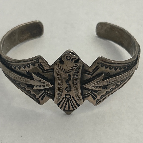 Fred Harvey Jewelry - vintage Fred Harvey Thunderbird whirling log Sterling cuff
